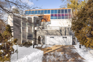Photo for 4637 E Lake Harriet Parkway, Minneapolis, MN 55419 - Listing #5700168 View of the generous size 2-stall, heated garage with plenty of storage. Windows above are the skylights to the indoor swimming pool.