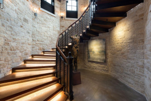 Photo for 835 Hunt Farm Road, Long Lake, MN 55356 - Listing #5693151 Entertain in the lower level showcasing the trio-arched stone fireplace, temperature-controlled wine storage and pub bar.