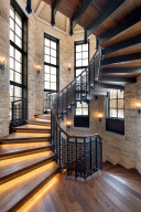 Photo for 835 Hunt Farm Road, Long Lake, MN 55356 - Listing #5693151 "A million dollar staircase." Built like a helix, the intricate railing system is not only ornamental but provides support for the entire staircase.