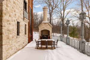 Photo for 835 Hunt Farm Road, Long Lake, MN 55356 - Listing #5693151 Dine outdoors on this stunning patio with artisan grill. Manually raise and lower the grill over a hot flame with the crank system, enhancing your outdoor grilling experience.