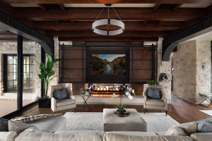 Photo for 835 Hunt Farm Road, Long Lake, MN 55356 - Listing #5693151 The great room features the uniquely designed fireplace and the wall of glass opens to the arched stone terrace.