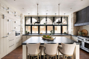 Photo for 835 Hunt Farm Road, Long Lake, MN 55356 - Listing #5693151 The kitchen looks out over a trio of aches that frame the views of the surrounding woods.