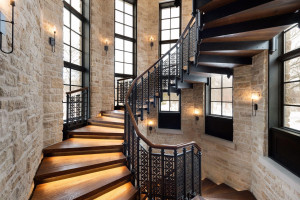 Photo for 835 Hunt Farm Road, Long Lake, MN 55356 - Listing #5693151 The grand spiral staircase leads to the luxurious upper level owner’s suite with sweeping views and two junior ensuite bedrooms.