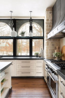 Photo for 835 Hunt Farm Road, Long Lake, MN 55356 - Listing #5693151 Professional-grade appliances and artistic ironworks range hood is just one the grand elements of this chef-inspired kitchen.