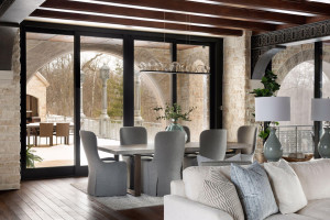 Photo for 835 Hunt Farm Road, Long Lake, MN 55356 - Listing #5693151 The dining room overlooks the stone arched terrace and outdoor dining area with stacked stone grill.