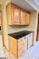 Photo for 15284 US Highway 59 NE, Thief River Falls, MN 56701 - Listing #5719756 cabinets and granite countertop by garage entrance