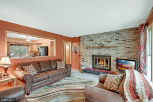Photo for 17919 University Avenue NE, Andover, MN 55304 - Listing #5741447 Full Wall Fireplace and open view to the kitchen