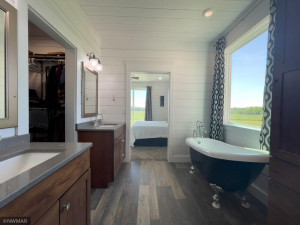 Photo for 24352 Everts Road NE, Tenstrike, MN 56683 - Listing #6005097 Master bath w/ claw tub, also walk in shower