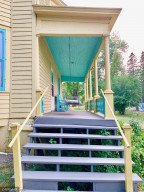 Photo for 106 Dale Avenue SW, Warroad, MN 56763 - Listing #6080574 Rain or shine, enjoy the views from the covered porch