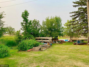 Photo for 106 Dale Avenue SW, Warroad, MN 56763 - Listing #6080574 Left side, snowmobile trail enters the river