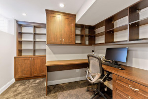 Photo for 4724 Ewing Avenue S, Minneapolis, MN 55410 - Listing #6091555 Basement home office with custom built-in desk and cabinets.