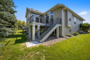 Photo for 17910 39th Place N, Plymouth, MN 55446 - Listing #6091309 View of the deck and the porch. Vinyl siding on the sides and rear of home.