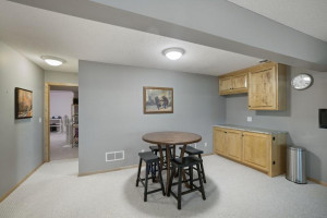 Photo for 17910 39th Place N, Plymouth, MN 55446 - Listing #6091309 Room for a table. A dry bar with convenient maple cabinets.
