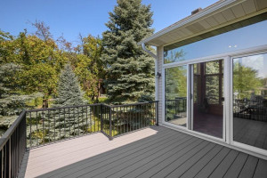 Photo for 17910 39th Place N, Plymouth, MN 55446 - Listing #6091309 The deck and porch have a LOT of privacy to the back with the large expanse of tall and thick evergreens.