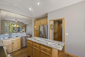 Photo for 17910 39th Place N, Plymouth, MN 55446 - Listing #6091309 Lots of maple cabinetry. This door leads to the foyer.
