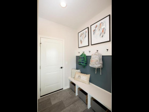 Photo for 11612 Brayburn Trail, Dayton, MN 55369 - Listing #6095318 The family foyer off the garage is the best space for everyone to drop their gear and leave boots and jackets.