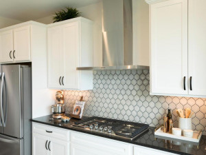 Photo for 11612 Brayburn Trail, Dayton, MN 55369 - Listing #6095318 Gas range and vented modern hood are pluses in this kitchen.