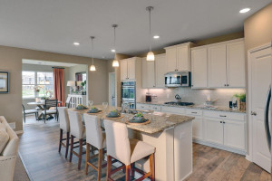 Photo for 18352 Hamel Drive, Lakeville, MN 55044 - Listing #6092594 Kitchen is open to the family room & dining area, providing an easy everyday flow. *All photos are of a former model home, please inquire for details.