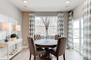 Photo for 13116 Zachary Lane N, Dayton, MN 55327 - Listing #6093893 Tucked off the kitchen is the home's dining space - which resides just adjacent to a walkout exit onto the back patio and into your HUGE backyard!! (Photos of the same floorplan, colors may vary).