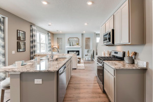 Photo for 13116 Zachary Lane N, Dayton, MN 55327 - Listing #6093893 A second view of the kitchen! Look at all that space available for the family cook to roam about! (Photos of the same floorplan, colors are similar).