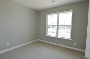Photo for 13205 Deerwood Lane N, Dayton, MN 55327 - Listing #6097796 There is a second main level bedroom off the front entrance, with windows overlooking the home's front porch and resides just adjacent to a full bathroom! (Photo of same plan, colors are similar)