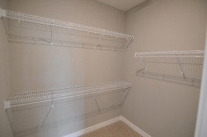 Photo for 13205 Deerwood Lane N, Dayton, MN 55327 - Listing #6097796 A peak inside the Primary closet - which is loaded with shelving! (Photo of same plan, colors are similar)