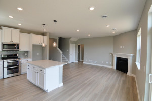 Photo for 13205 Deerwood Lane N, Dayton, MN 55327 - Listing #6097796 The epitome of the open concept home design - with the bonus of soaring windows shedding natural light throughout the entire main level living areas!! (Photo of same plan, colors are similar)