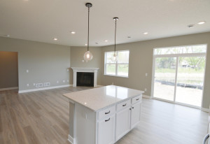 Photo for 13205 Deerwood Lane N, Dayton, MN 55327 - Listing #6097796 The epitome of the open concept home design - with the bonus of soaring windows shedding natural light throughout the entire main level living areas!! (Photo of same plan, colors are similar)