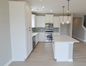 Photo for 13205 Deerwood Lane N, Dayton, MN 55327 - Listing #6097796 A kitchen that just makes sense! One of the man advantages in the new home design!! (Photo of same plan, colors are similar)