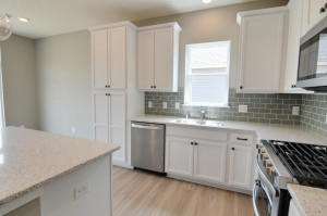 Photo for 13205 Deerwood Lane N, Dayton, MN 55327 - Listing #6097796 All that elegance, yet so much room to utilize while preparing that next masterpiece - or even just re-heating last night's leftovers!! (Photo of same plan, colors are similar)