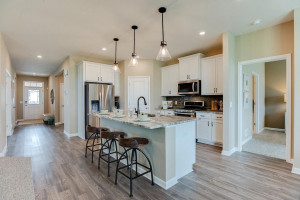Photo for 13633 Applewood Trail, Rosemount, MN 55068 - Listing #6098803 A kitchen built to perform! Equipped with stainless steel appliances, granite countertops and a large island, this kitchen adds distinction and character! *Photo of previous model home