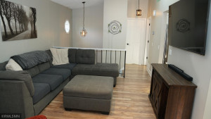 Photo for 6018 Covington Terrace, Minnetonka, MN 55345 - Listing #6096579 The Family Room is perfect for catching up on your favorite shows with friends and family. The Stair Railing keeps this open concept flowing.
