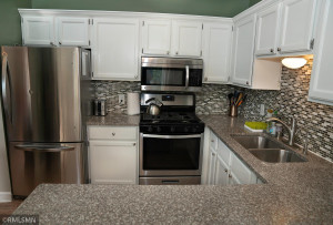 Photo for 6018 Covington Terrace, Minnetonka, MN 55345 - Listing #6096579 Stainless Steel Appliances welcome you to the kitchen along with the Granite Counter Tops and SS under-mount sink!