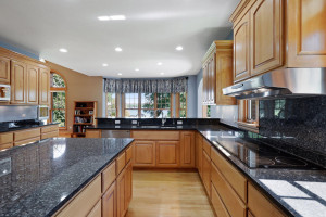 Photo for 6900 Minnewashta Parkway, Excelsior, MN 55331 - Listing #6098438 The granite countertops are the perfect worksurfaces for whipping up tasty meals and treats.