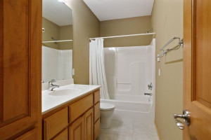Photo for 6900 Minnewashta Parkway, Excelsior, MN 55331 - Listing #6098438 A full bathroom in the lower level is complete with a built -in linen cabinet.