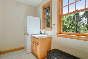 Photo for 6900 Minnewashta Parkway, Excelsior, MN 55331 - Listing #6098438 The main level laundry room was designed with a stacking washer and dryer and features additional space for a craft room or sewing space.