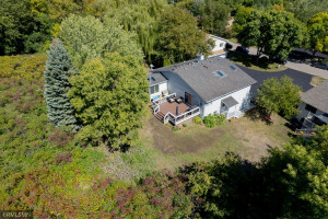Photo for 6018 Covington Terrace, Minnetonka, MN 55345 - Listing #6096579 A Look From the Sky towards the natural setting of the Town House.