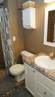 Photo for 6018 Covington Terrace, Minnetonka, MN 55345 - Listing #6096579 Tiled lower level bathroom that is accessed from the bedroom.