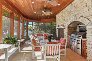 Photo for 3960 Walden Shores Road, Wayzata, MN 55391 - Listing #6097898 Porch highlights include a beautiful stone accent wall, wood ceiling, built-in gas grill and a wood-burning fireplace to fend off the evening chill in the cooler months