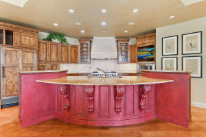 Photo for 3960 Walden Shores Road, Wayzata, MN 55391 - Listing #6097898 Gourmet kitchen offers high-end appliances, gas range with multiple burners, warming drawers, granite tops, walk-in pantry and stone surround vent hood