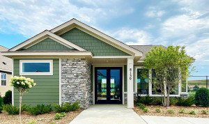 Beautifully landscaped clubhouse entrance.