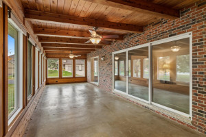 Photo for 765 Sibley Drive, Northfield, MN 55057 - Listing #6110010 Grab that bottle of wine or spritzer and head on out of the 3-season porch with full window surround, knotty pine ceilings and walls.