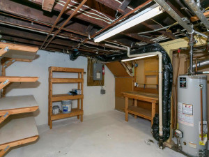 Photo for 991 Stryker Avenue, West Saint Paul, MN 55118 - Listing #6109307 Utility/Storage room. Sump pump located behind half wall door.