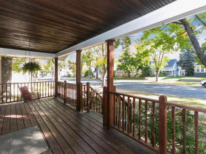 Photo for 991 Stryker Avenue, West Saint Paul, MN 55118 - Listing #6109307 View towards street. Wood plank flooring, ceiling and railing.