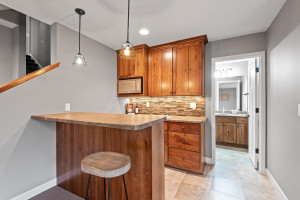 Photo for 11610 Aster Lane, Woodbury, MN 55129 - Listing #6114865 Share your favorite pint with friends and family at this cozy wet bar.