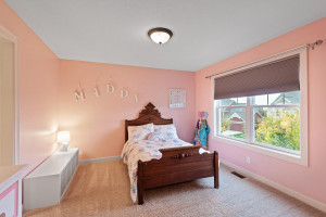 Photo for 11610 Aster Lane, Woodbury, MN 55129 - Listing #6114865 This princess suite features a large window with tree-top views, a walk-in closet and en-suite bath.