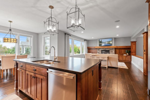 Photo for 11610 Aster Lane, Woodbury, MN 55129 - Listing #6114865 The kitchen features ample cabinetry and plenty of space to cook or entertain. Great natural light exudes throughout the space, making this space a relaxing room to test your culinary skills.