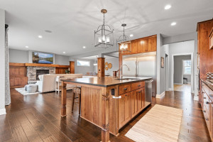 Photo for 11610 Aster Lane, Woodbury, MN 55129 - Listing #6114865 The kitchen shines with stainless steel appliances, soapstone countertops and a vast island with seating.