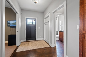 Photo for 11610 Aster Lane, Woodbury, MN 55129 - Listing #6114865 Just inside the front door, the foyer features a nook for guests to hang coats or purses or umbrellas.