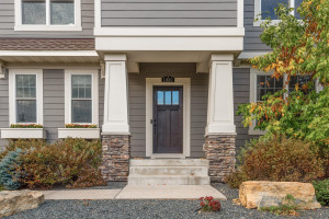 Photo for 11610 Aster Lane, Woodbury, MN 55129 - Listing #6114865 A covered front portico welcomes guests into this lovely home.